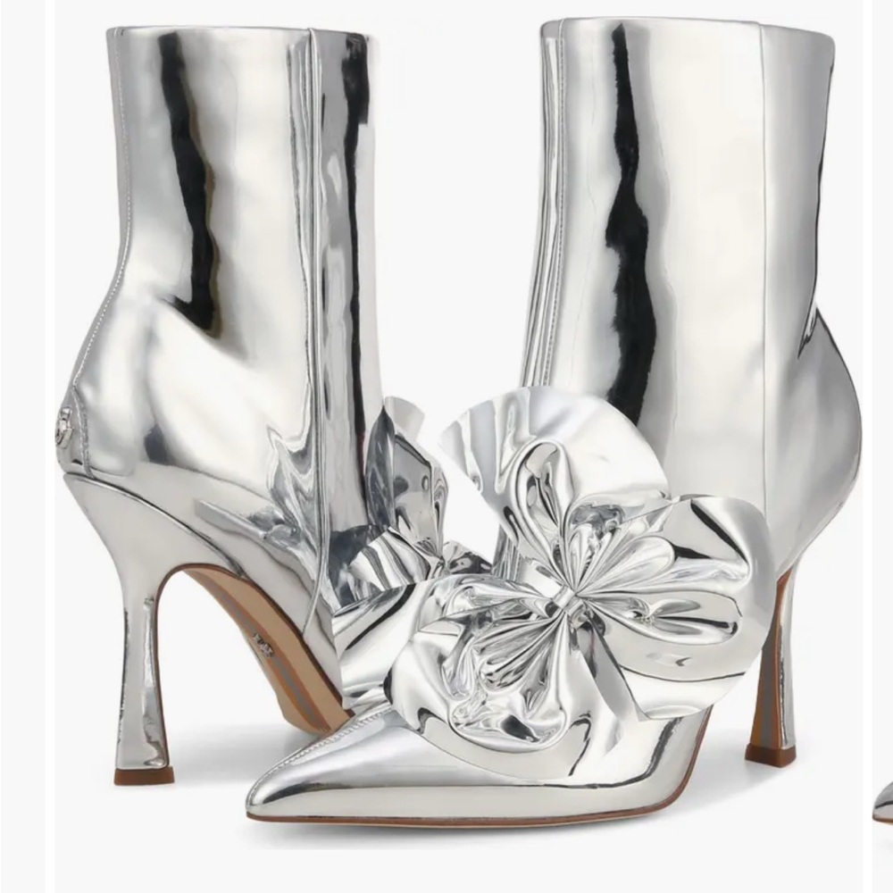 Sam Edelman bold bow emblellishment
Silver Heeled Boots with Sculptural Heel